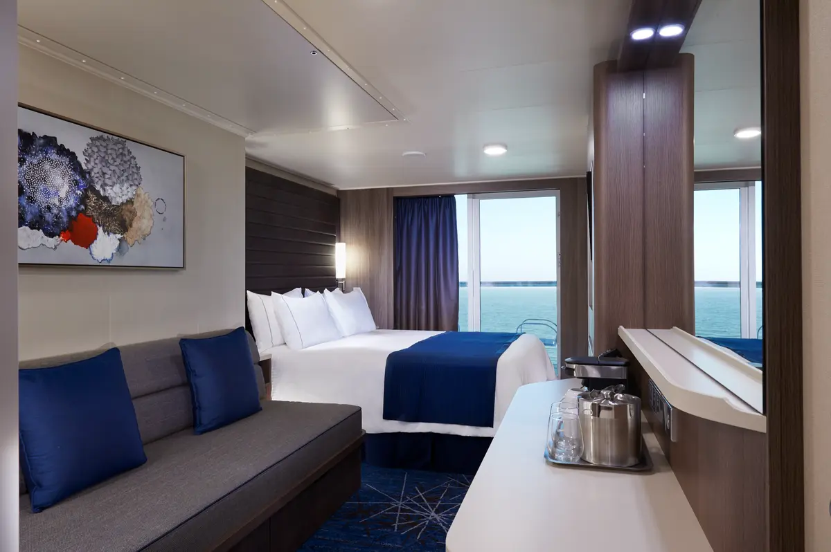 Club Balcony Suite with sitting area and balcony